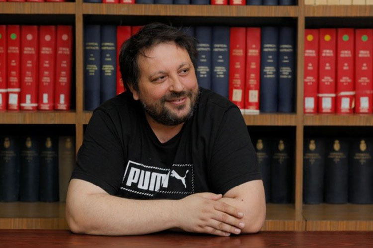 Dr. Adrian E. Ion